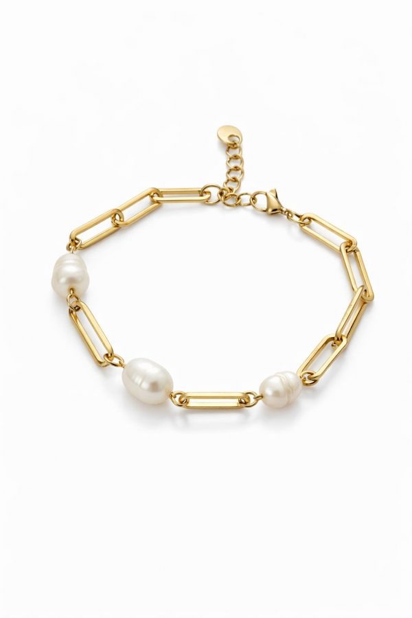 pulsera de caenda y perlas dorada